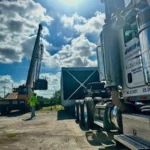 close-up of fleet truck receiving heavy load